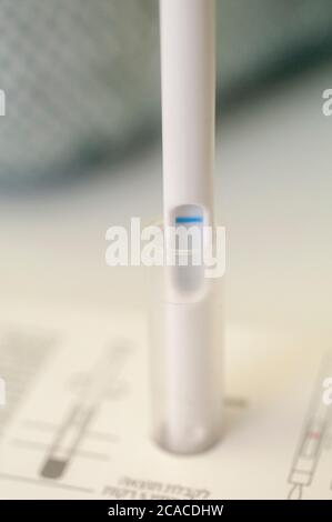 Home diagnosing of streptococcus A (Strep A) with a throat swab Stock Photo