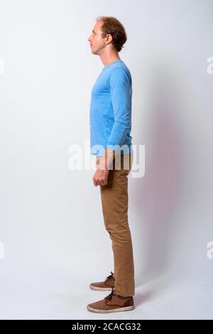 Man with blond hair against white background Stock Photo