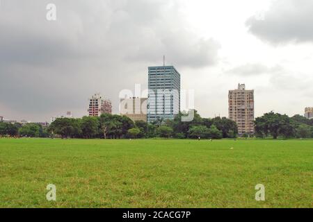 kolkata west bengal india on 4th april 2011: cityscape and green kolkata maidan. Stock Photo