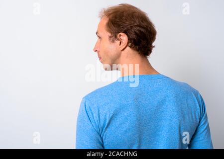 Man with blond hair against white background Stock Photo