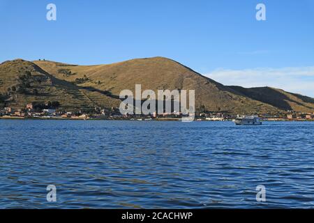 The Town of Puno View from the Cruise Boat of Lake Titicaca, Puno, Peru, South America Stock Photo