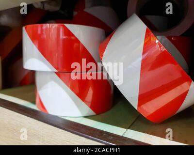 red-and-white ribbon for fencing of the territory Stock Photo