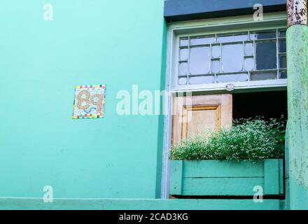 Brightly coloured green mosque in the historic neighborhood of Bo-Kaap, Cape Town, South Africa Stock Photo