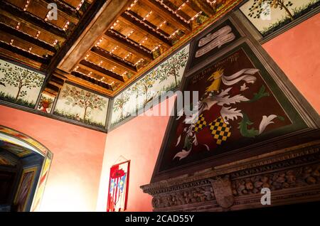 RIVAROLO, ITALY - MAY 28, 2017: Castle of Malgrà in Rivarolo Canavese (Italy) on may 28, 2017. Detail of the fireplace room with neo gothic XIX centur Stock Photo