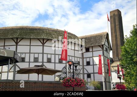 London, UK – July 30, 2009 : The  Globe Theatre of William Shakespeare advertising tours and exhibitions with banners and is a popular tourism travel Stock Photo