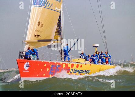 Yachts competing on the last leg of the 1997-1998 Whitbread Round the World Race racing in The Solent approaching the finish line at Southampton, England, UK - view of the winning yacht  EF Language skippered by Paul Cayard Stock Photo