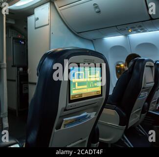 DUBAI, UAE - JANUARY 26, 2016: The inside business class seat, "Fly Dubai" Airbus Boeing 737 of Emirates at Dubai airport, United Arab Emirates. Stock Photo