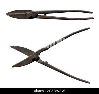 old rusty metal scissors on a white isolated background Stock Photo