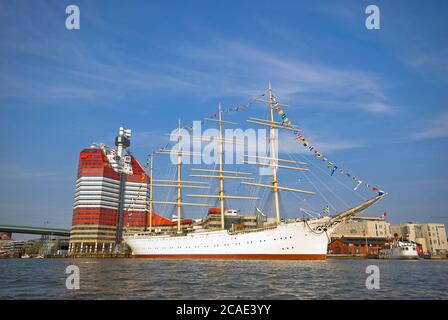 Barken Viking hotel (historical four-masted steel ship) and the Lipstick building in Gothenburg Harbour, Sweden Stock Photo