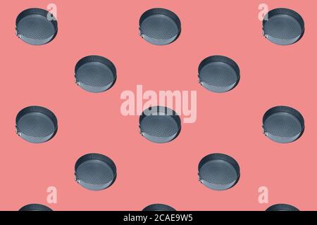Seamless pattern of Round metal cake pan, tin for baking cakes and cookies. Black collapsible stainless steel round cooking empty pan for cupcakes on Stock Photo