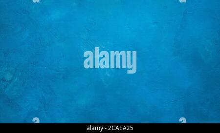 A blue cement wall textured background with small cracks on it. Background concept. Stock Photo