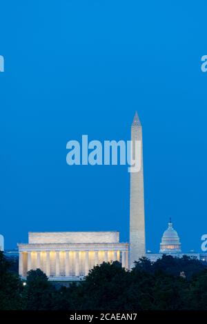 A blue hour photo of the D.C. Memorials at night.