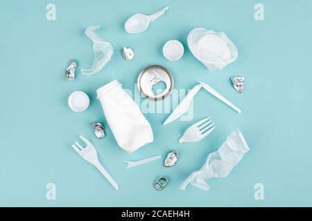 Plastic waste collection on blue background. Concept of Recycling plastic and ecology. Stock Photo
