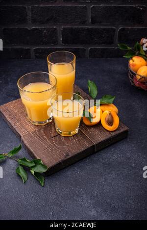 Apricot juice in glass. Healthy drink Stock Photo