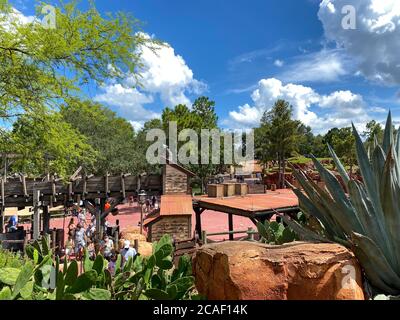 Orlando,FL/USA- 7/25/20: The view of frontierland from Big Thunder Mountain ride with people wearing face masks and social distancing at Walt Disney W Stock Photo