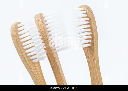 Bamboo toothbrush on white background Stock Photo