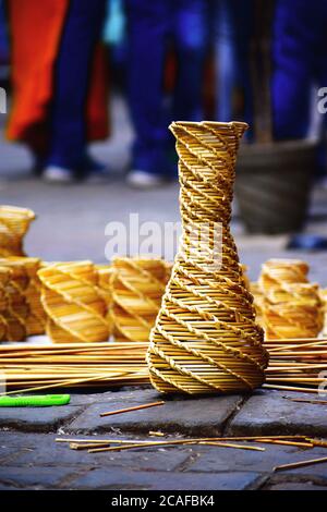 A beautiful golden grass handicraft for sale at janpath market in New Delhi. Stock Photo