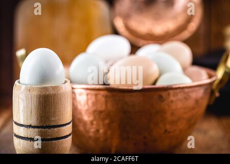 Brazilian free-range eggs, natural free-range eggs from Minas Gerais, in copper pots. Typical Brazilian cuisine. Stock Photo