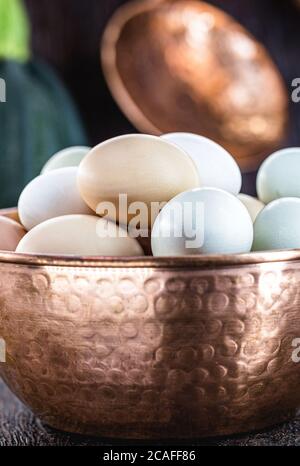 Brazilian free-range eggs, natural free-range eggs from Minas Gerais, in copper pots. Typical Brazilian cuisine. Stock Photo