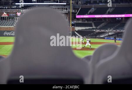 Atlanta, Georigia, USA. August 06, 2020: Atlanta Braves mascot Blooper  waves the team flag after a game winning home run by Nick Markakis during  the ninth inning of a MLB game against