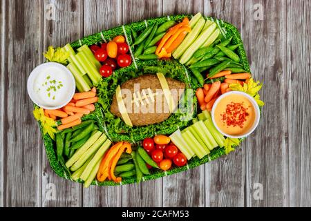 American football game concept. Catering fresh meal for fan of football game. Stock Photo