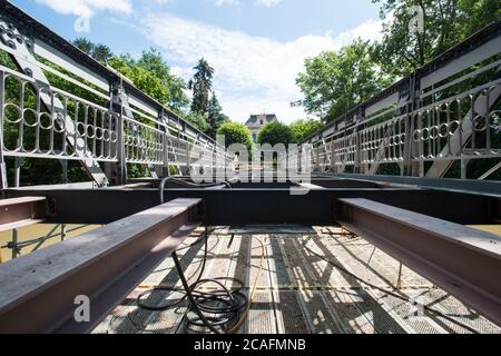 Policka, Czech Republic. 05th Aug, 2020. The listed steel bridge in Policka, Svitavy region, Czech Republic, is seen during repair of that bridge on August 8, 2020. Reconstruction for 6.5 million crowns will last until the end of October 2020. Steel lattice bridge of riveted construction about 20 meters long and 4.3 meters wide on masonry embankment pillars was declared a technical monument in June 2019. Credit: Josev Vostarek/CTK Photo/Alamy Live News Stock Photo