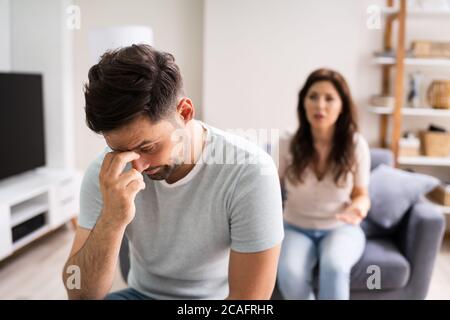 Sad Man Arguing Couple Family Divorce With Woman Stock Photo