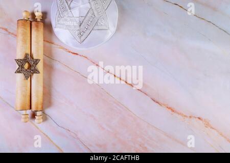 Jewish manuscript, old papyrus roll on abstract background. Stock Photo
