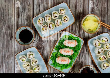 Catering fresh sushi roll for fan of football game. American football game concept. Asian cuisine. Stock Photo