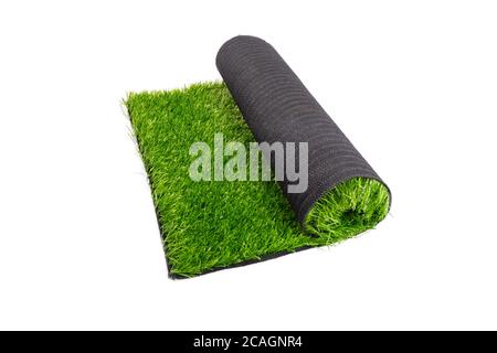 artificial turf, coating, roll of artificial green grass isolated on white background. Stock Photo