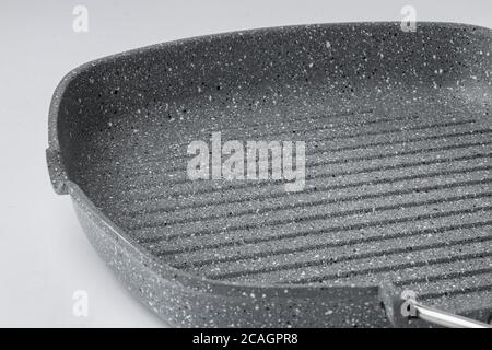 New ceramic non stick frying pan on white background Stock Photo