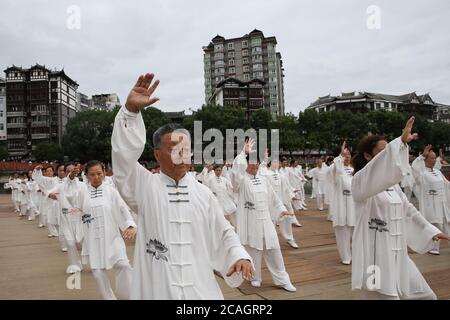 Chongqing, Chongqing, China. 7th Aug, 2020. SichuanÃ¯Â¼Å'CHINA-On August 7, 2020, Qianjiang District of Chongqing held the launching ceremony of national fitness series activities at the Banks of Wuling River, where taijiquan, fitness Qigong, yoga, square dance, softball, roller-skating and other sports were displayed to welcome the arrival of the 11th National Fitness Day. Credit: SIPA Asia/ZUMA Wire/Alamy Live News Stock Photo