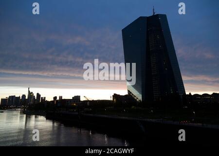 28.06.2020, Frankfurt am Main, Hessen, Germany - The European Central Bank (ECB) in dramatic lighting on the left side of the river Main and the skyli Stock Photo