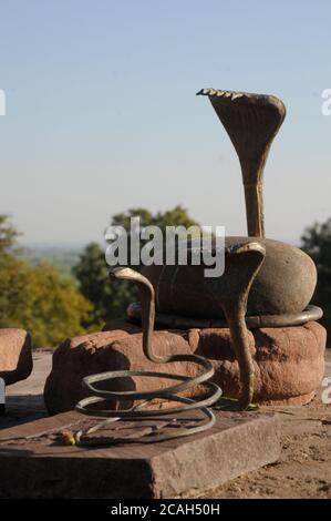 Giant copper snake deity at the Bhojeshwar Temple is an incomplete Hindu temple in Bhojpur village near the state capital Bhopal, Madhya Pradesh, Indi Stock Photo