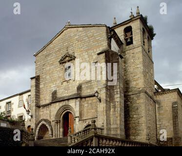 Spain, Galicia, Lugo province, Viveiro. Old Monastery of San Francisco (now the parish Church of Santiago). Temple dated from the 12th century. Romanesque doorway. Stock Photo