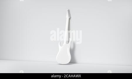 Blank white electric guitar mockup, stand near wall, backside view Stock Photo