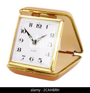 Old retro travel alarm clock isolated on a white background Stock Photo