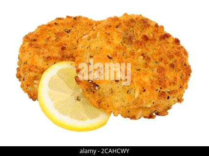 Breadcrumb covered salmon fish cakes isolated on a white background Stock Photo