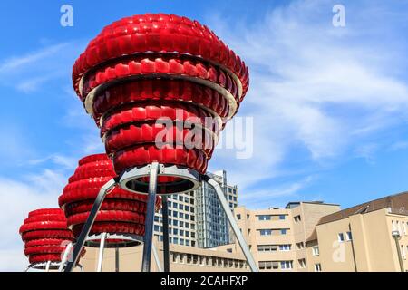 'Dortmunder Rosen' vibrant red public art installation made from recycled car lights by Winter / Hoerbelt, outside Dortmunder U museum, Germany Stock Photo