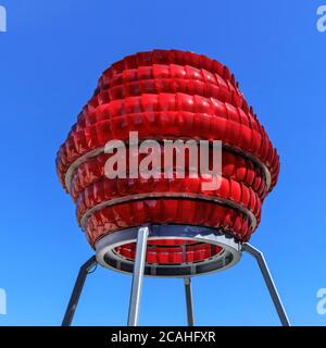 'Dortmunder Rosen' vibrant red public art installation made from recycled car lights by Winter / Hoerbelt, outside Dortmunder U museum, Germany Stock Photo