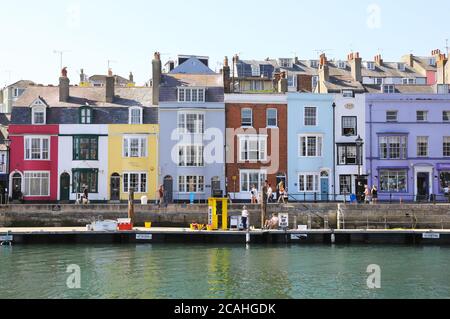 The pretty Old harbour in Weymouth, Dorset, on a busy summer's day, on the south England coast, UK Stock Photo