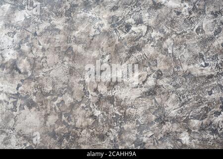 Pattern of old gray decorative plaster on the wall Stock Photo