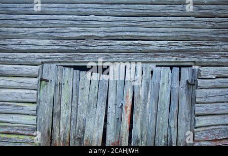 Old wooden storage shed log walls and doors , Finland Stock Photo