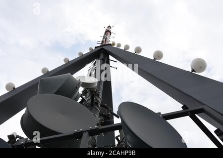View on the top of look-out tower with antennas and amplifiers in Uetliberg mountain in the Swiss plateau, part of the Albis chain. Stock Photo