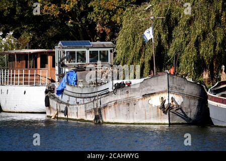 An old Dutch Barge moored in the River Thames at Old Windsor, on a perfect autumn day Stock Photo