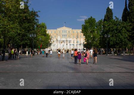 ATHENS, GREECE -AUGUST 12 2016: View of Syntagma Square towards the Old Royal Palace, now Parliament, in Athens Stock Photo