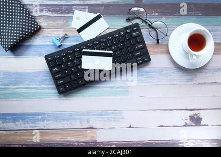 online shopping concept with credit cards on keyboard Stock Photo
