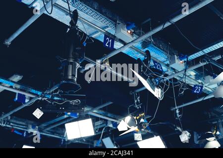 Broadcast television studio room with LED lights on the ceiling. Stock Photo