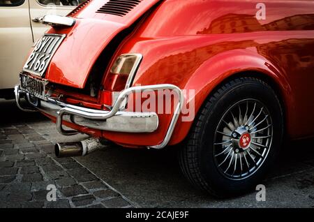 TURIN, ITALY - SEPTEMBER 24, 2017 - Old red Fiat 500 Abarth during a classic car rally in Vittorio Veneto Square, Turin (Italy) on september 24, 2017. Stock Photo