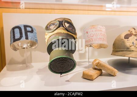 Gas mask case giving out by the ARP (Air Raid Precautions) during World War 2. Falaise Memorial - Civilians at War. Falaise, Calvados, France Stock Photo